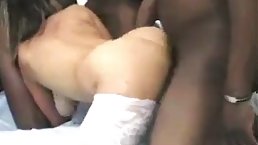 Big tits MILF in white stockings loves multiblack gangbang