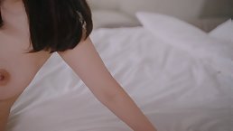 Busty Asian MILF gets her shaved pussy pounded hard