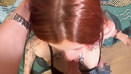 Tattooed redhead babe Lina Migurtt sucks dick POV