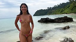 Slender tanned brunette girl gets fucked on the beach
