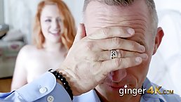 Young redhead babe gets a present and massive fucking from older dude