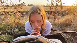 Pretty redhead girl sucks dick outdoor and gets facial
