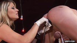 Big tits blonde MILF getting plowed in a BDSM dungeon