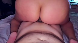 Big ass brunette MILF with anal plug sucks and rides dick POV