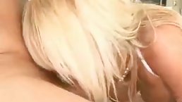 Busty blonde MILF in stockings gives up the ass