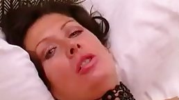 Big tits British mature fucks young guy
