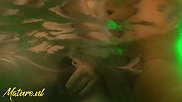 Nina Heels eats out a hairy mature pussy in the swimming pool