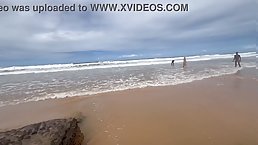 Nude girls having fun on the beach