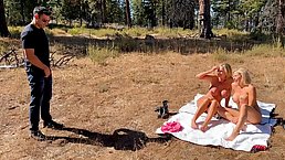 Two busty MILFs tanning seduce a hiker to get a shared creampie