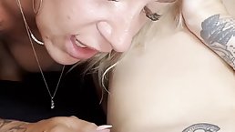 Busty tattooed blonde MILF Michelleboss gets her pussy licked by her BFF