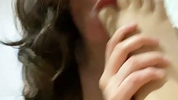 Amateur busty tattooed girl gets a good tit massage with feet and oiled (POV)
