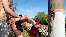 Submissive redhead wife gets spanked and fisted at public railway station