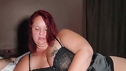 Amateur redhead BBW MILF stroking cock on cam