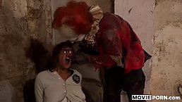 Crazy clown fucks captured brunette girl