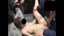 Amateur busty MILF gangbanged in the adult theater