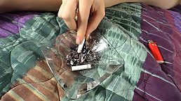 Small tits redhead babe smokes cigarette and masturbates