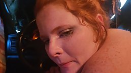 Amateur redhead BBW slut sucks dildo in the car