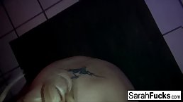 Busty blonde MILF Sarah Jessie gives a blowjob in the bathroom