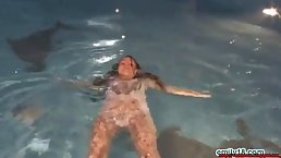 Small tits brunette teen Emily masurbates near the pool at night