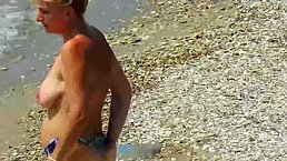 Spying on a mature with saggy tits, big areola and hard nipples
