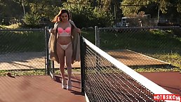 Horny brunette girl in sexy lingerie plays solo outdoors