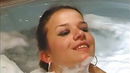 Sexy brunette MILF with nice tits gets fucked in Jacuzzi