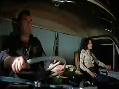 Two lucky truck drivers pick up a real whore that needs a long ride and is not shy
