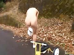 Perverted Japanese girl with big boobies is a perfect sex doll in an outdoor scene