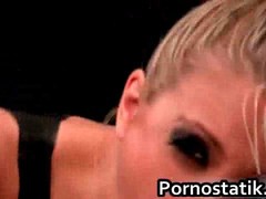 Hot blonde in lingerie and fishnets sucks guy's cock and takes it deep in her wet pussy.