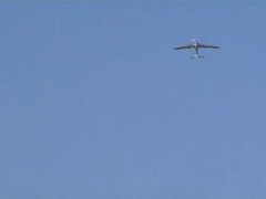Girl had wonderful time flying with plane, and on ground gets even better.