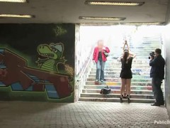 Femdom action in a public place with well trained slave giving pleasure to random passers by