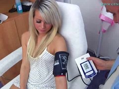 Beautiful blond girl likes going to her doctor for an exam, because he always touches her properly