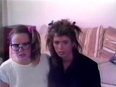 Two adorable curly haired chicks take a bath together and scissor their wet pussies until they cum