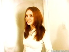 Lovely, red haired teen is sucking the biggest cock she has ever seen in her life