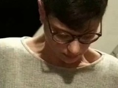 Lovely amateur lady with short hair and glasses is getting fucked in a big studio