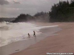 Very romantic couple is having sex on the beach while no one is watching them