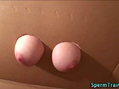 Naughty girl is sucking dick through a gloryhole and listening to a guy moaning from pleasure