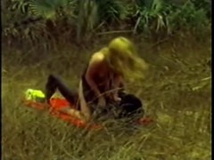 Lovely blonde went to beach for sunning nude and find black guy with solid cock for fuck