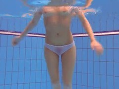 Red haired babe, Katka took off her clothes in the swimming pool and enjoyed naked