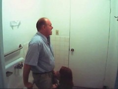 Teacher and secretary in a blowjob video filmed by a spy camera in the bathroom