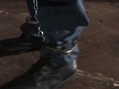 Isis Love took off her leather costume and put on a strap- on to fuck her sex slave