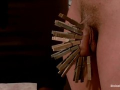 Beautiful, red haired woman was putting peggs on her lover's balls, before she gave him a blowjob