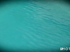 Instead of swimming in the pool, two passionate lesbians are making love next to it