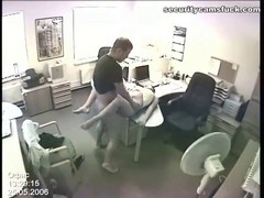 A hidden camera caught a horny couple having sex in the office during their work hours
