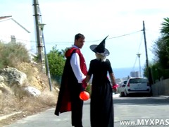 Horny woman dressed up as a witch was having sex with two guys, in the forest