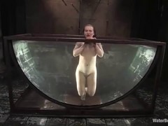 Katja Kassin is being tortured with water after her pussy was drilled with a fucking machine