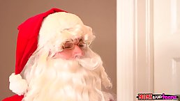 Hot mom and her teen girlfriend are making love in the living room, with a handsome Santa