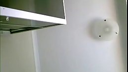 Amateur hot girl set up a camera in her bathroom and started touching her pussy