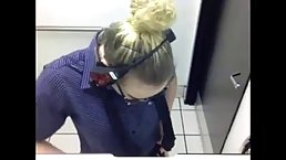 Lovely girl is playing with her tits while talking to her customer on the phone