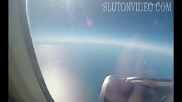 Slutty babe is sucking dick in the plane while her boyfriend is moaning from pleasure
